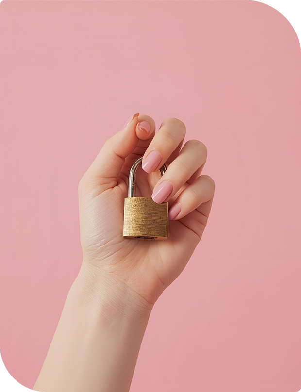 Hand holding padlock